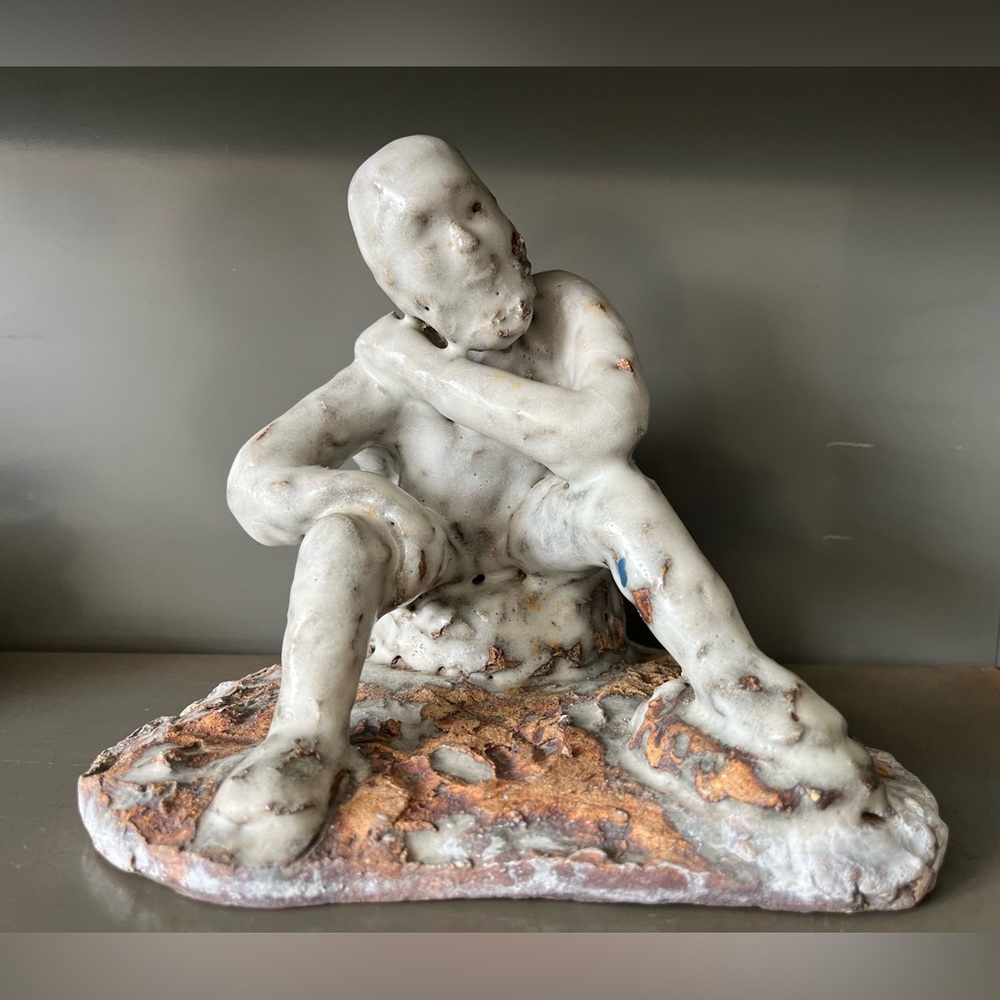 Clay White Glaze Sculpture Man Resting with a Bag on His Back one of a kind